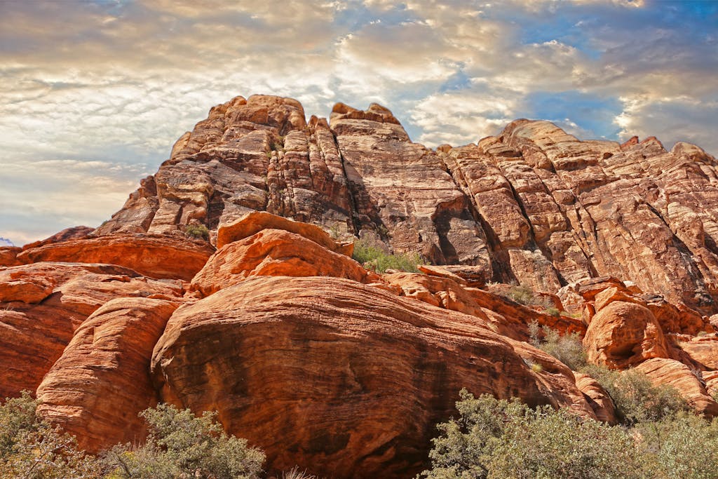 Capture of Red Rock Canyon's stunning geological formations during a serene sunset.
