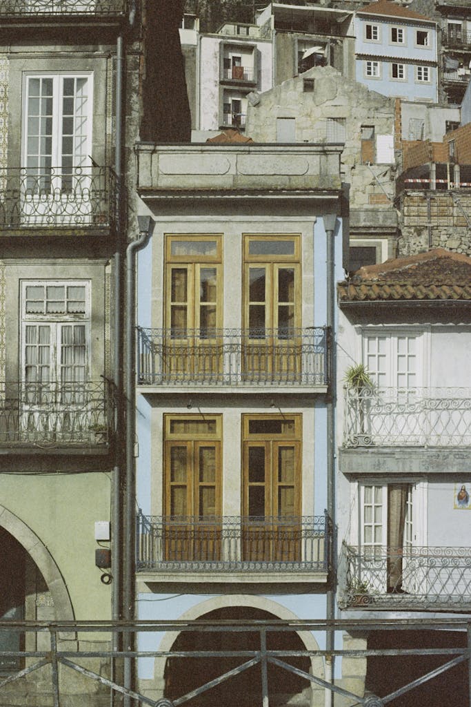 Elegant narrow townhouse with traditional architecture in Porto, Portugal, showcasing urban charm.
