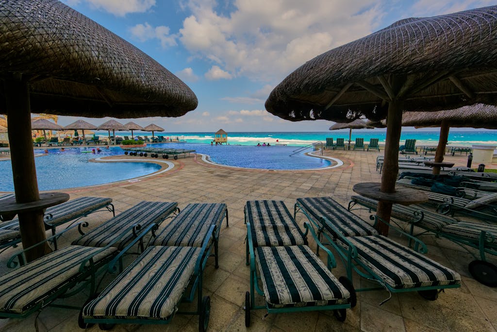 Relax by the resort pool with ocean view at Soledad de Graciano Sánchez in Mexico.